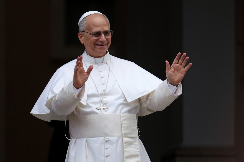 Castelgandolfo, Italy - August 17, 2025: Pope Leo XIV recites the Angelus and imparts his blessing at the gates of the Apostolic Palace before thousands of faithful in Castelgandolfo.